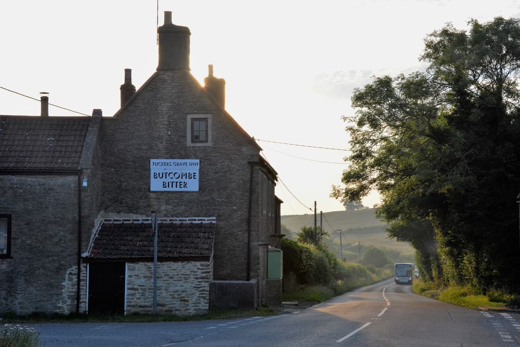 Tucker's Grave Inn at golden hour, seen from the Faulkland crossroads