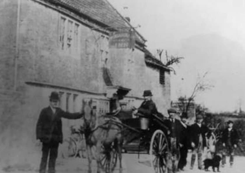 A horse and cart outside the inn in an early photograph
